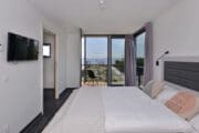 Slaapkamer in het vakantiehuis van Oasis Punt West