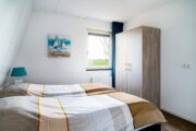 Slaapkamer van Vakantiehuis Sneekermeer