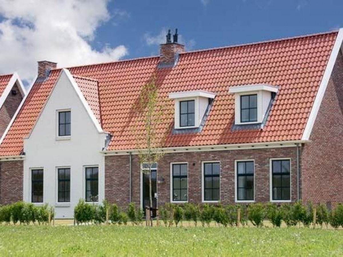 Verblijf in luxe en ruime vakantiewoningen gebouwd in Zeeuwse stijl op Parc Ganuenta in Zeeland